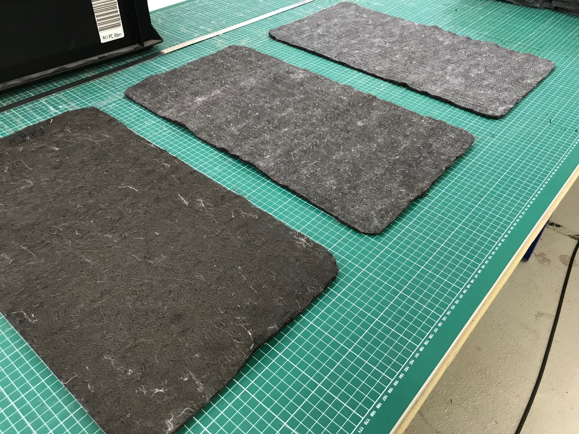 Hybrid nonwoven material